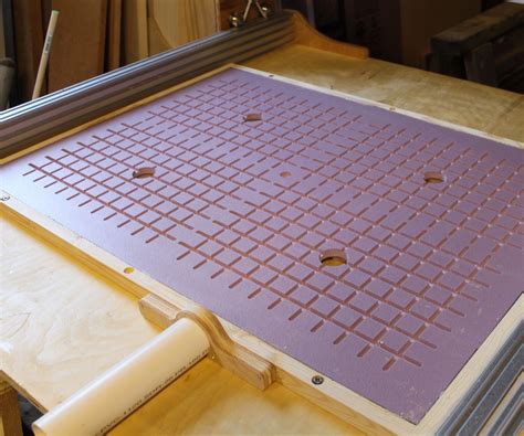 Improving suction on a vacuum table .